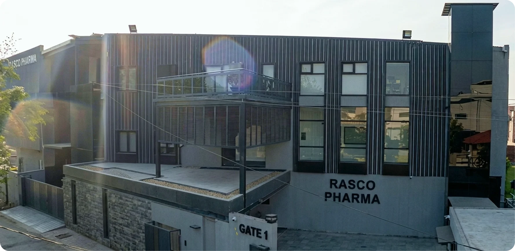 Banner image of the RASCO Pharma building featured as a ResourceInn HRMS client.