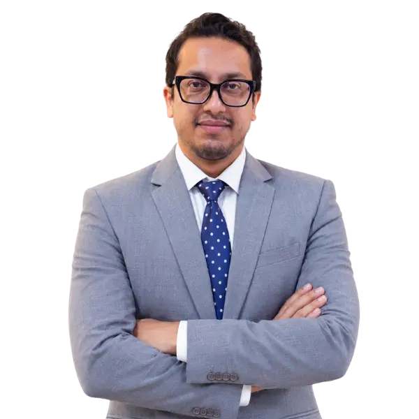 Muhammed Hafeez Ullah, Deputy Manager HR, in a grey suit and blue tie with arms crossed