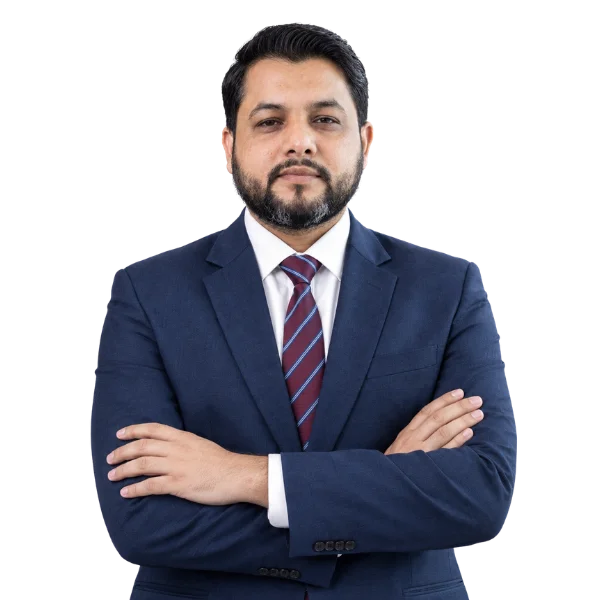 Sabir Mehmood, HR professional specializing in payroll and HRIS, in a navy suit with arms crossed